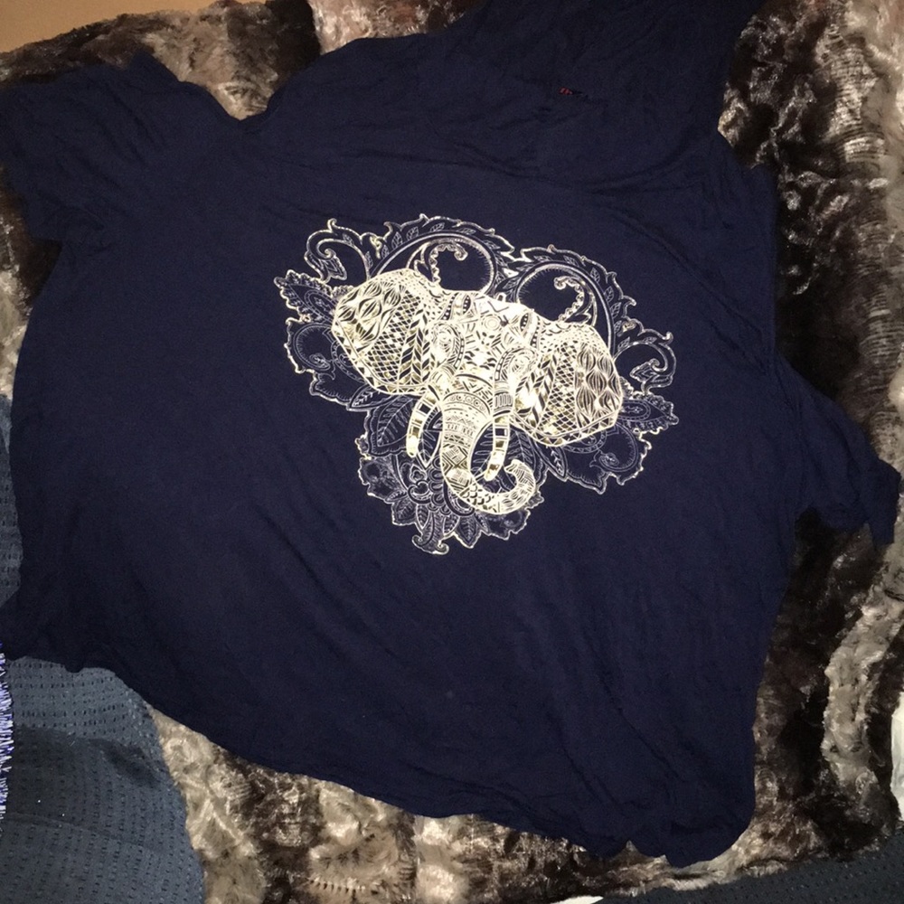 Dark blue shirt with gold elephant